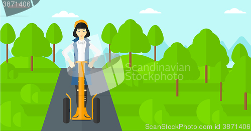 Image of Woman riding on electric scooter.