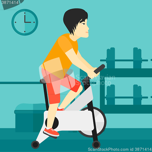 Image of Man doing cycling exercise.