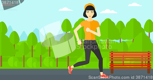Image of Sportive woman jogging.
