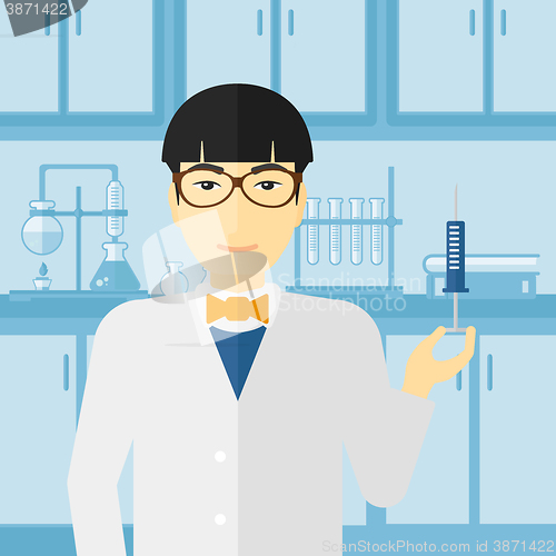 Image of Doctor with syringe in laboratory.