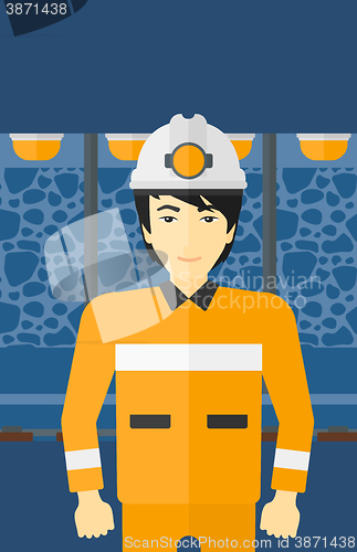 Image of Confident miner in hardhat.