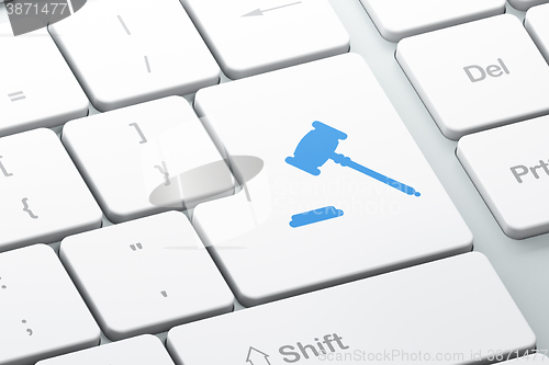 Image of Law concept: Gavel on computer keyboard background