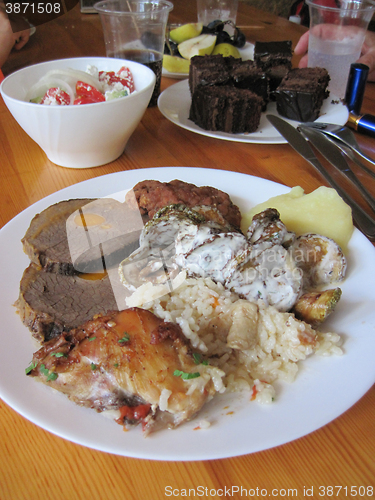 Image of beef meat with carrot and rice