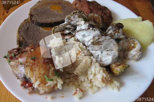 Image of beef meat with carrot and rice