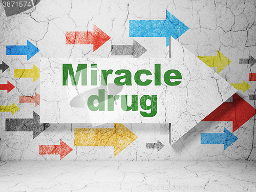 Image of Healthcare concept: arrow with Miracle Drug on grunge wall background