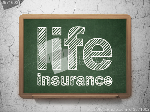 Image of Insurance concept: Life Insurance on chalkboard background