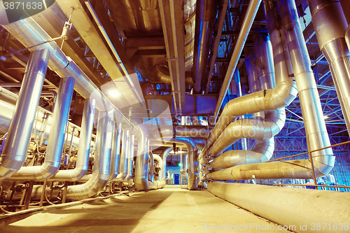 Image of Industrial zone, Steel pipelines, valves, cables and walkways