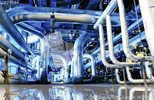 Image of Industrial zone, Steel pipelines in blue tones with reflection