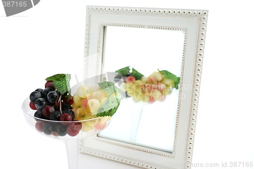 Image of Isolated Grapes In a Glass