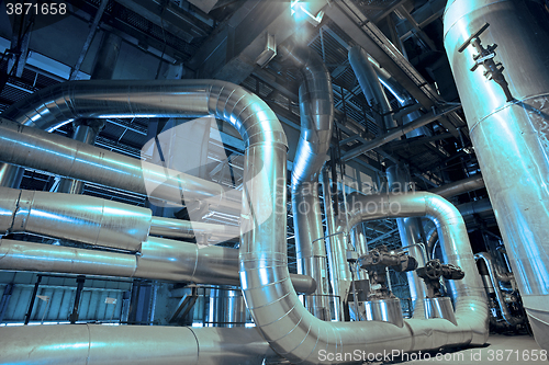 Image of Industrial zone, Steel pipelines, valves, cables and walkways