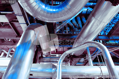 Image of Industrial zone, Steel pipelines, valves, cables and walkways