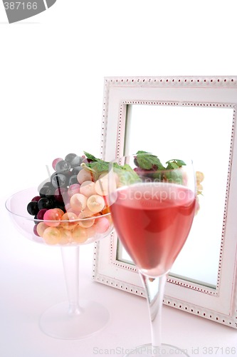 Image of Isolated Grapes In a Glass