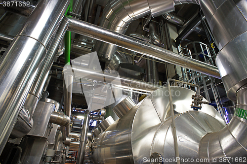 Image of Industrial zone, Steel pipelines, valves, cables and walkways