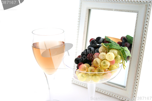 Image of Isolated Grapes In a Glass