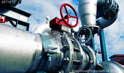 Image of Industrial zone, Steel pipelines in blue tones  