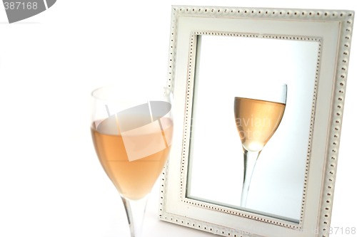 Image of Isolated Wine in front of a Mirror