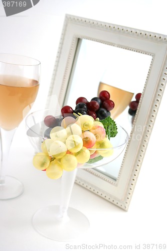 Image of Isolated Grapes In a Glass