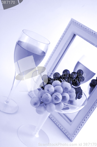 Image of Isolated Grapes In a Glass