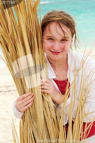Image of Portrait of a girl on tropical beach