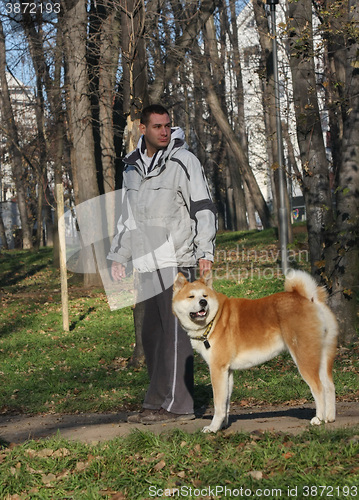 Image of Proud man and his gorgeous dog