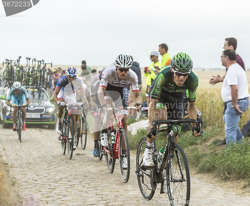 Image of Inside the Peloton on a Cobblestone Road - Tour de France 2015