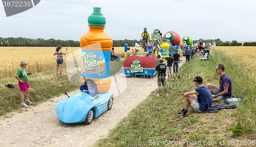 Image of Teisseire Caravan on a Cobblestone Road- Tour de France 2015