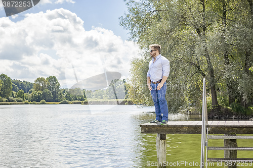 Image of man at the lake