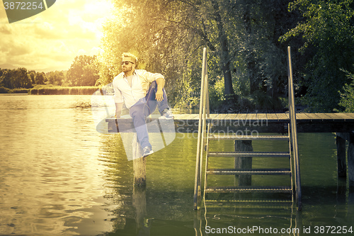 Image of man at the lake