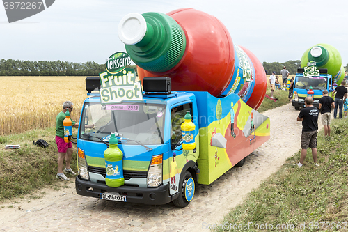 Image of Teisseire Caravan on a Cobblestone Road- Tour de France 2015