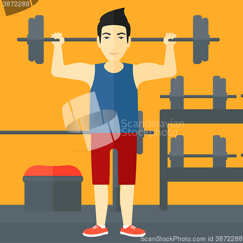 Image of Man lifting barbell.