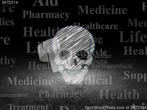 Image of Health concept: Scull in grunge dark room