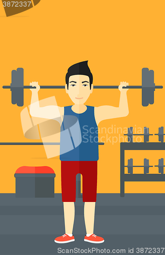 Image of Man lifting barbell.