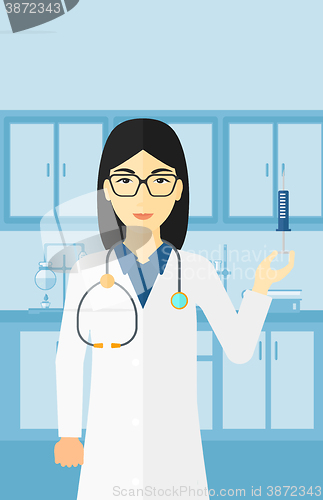 Image of Doctor with syringe in laboratory.