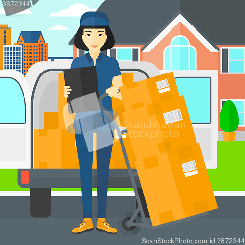 Image of Woman delivering boxes.