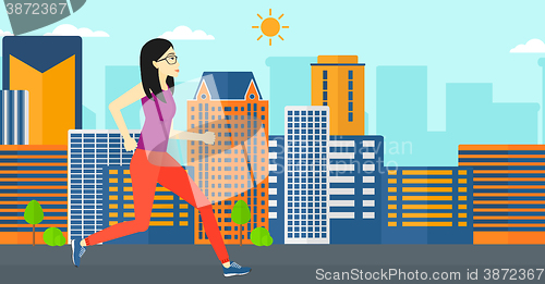 Image of Sportive woman jogging.