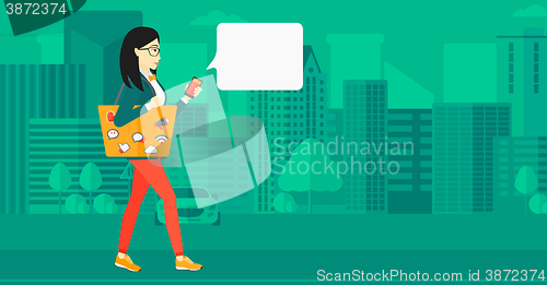 Image of Woman walking with smartphone.