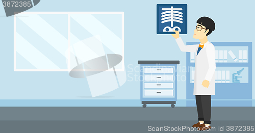 Image of Doctor examining radiograph.