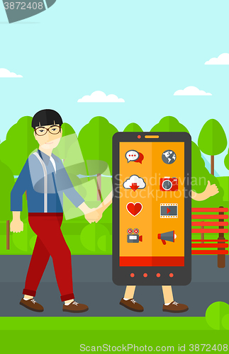 Image of Man walking with smartphone.