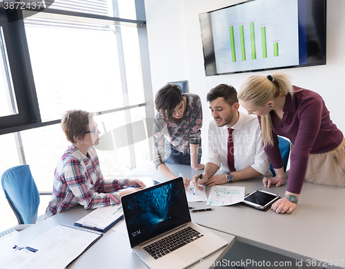 Image of young business people group on meeting at modern office