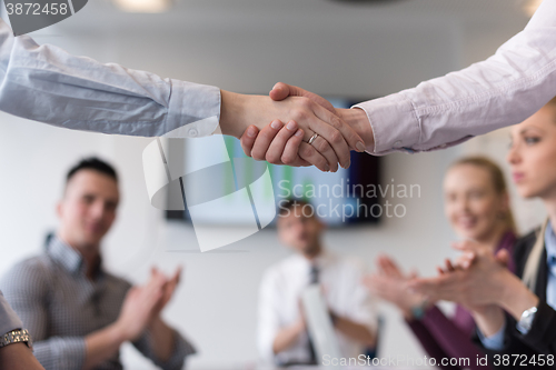 Image of business womans handshake