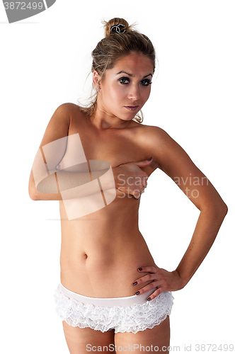 Image of Attractive woman covering breast