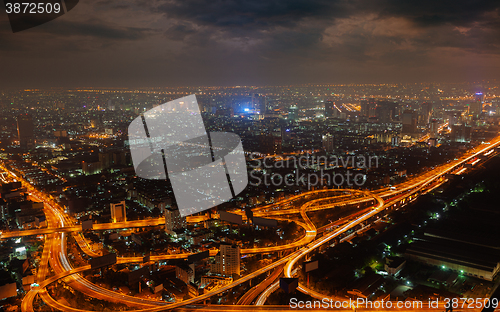 Image of Aerial view of modern big city at night