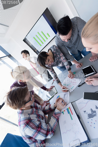 Image of top  view of business people group brainstorming on meeting
