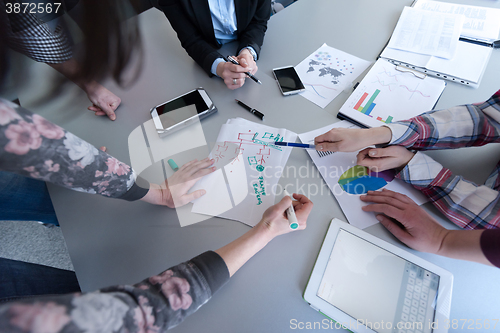 Image of top  view of business people group brainstorming on meeting