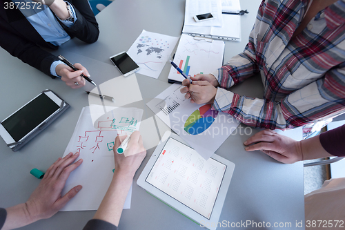 Image of top  view of business people group brainstorming on meeting