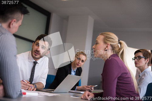 Image of business people group on meeting at modern startup office