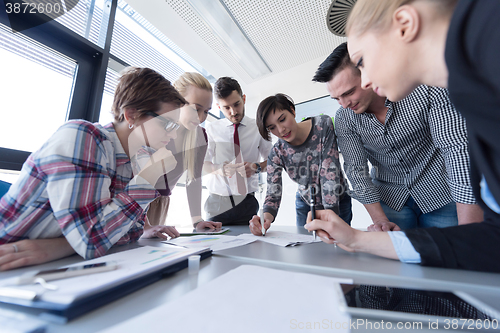 Image of top  view of business people group brainstorming on meeting