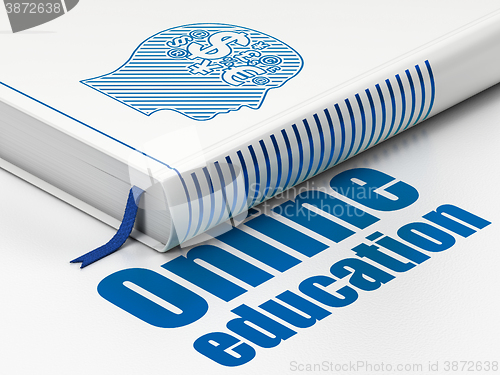Image of Learning concept: book Head With Finance Symbol, Online Education on white background