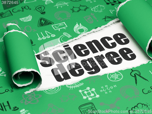 Image of Science concept: black text Science Degree under the piece of  torn paper