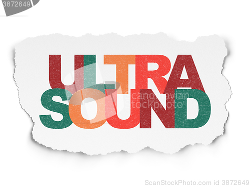Image of Healthcare concept: Ultrasound on Torn Paper background